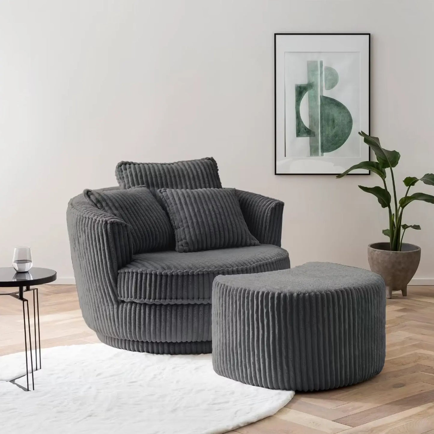 XXL-Drehsessel mit grauem Breitcord-Bezug und passendem Hocker