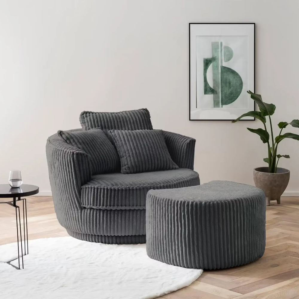 XXL-Drehsessel mit grauem Breitcord-Bezug und passendem Hocker