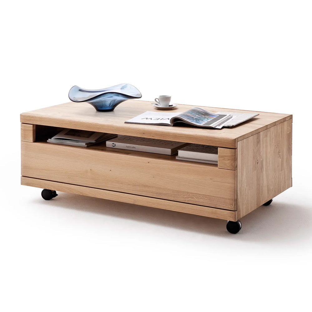 
                  
                    Couchtisch mit Schublade mit Rollen aus massiver Eiche
                  
                